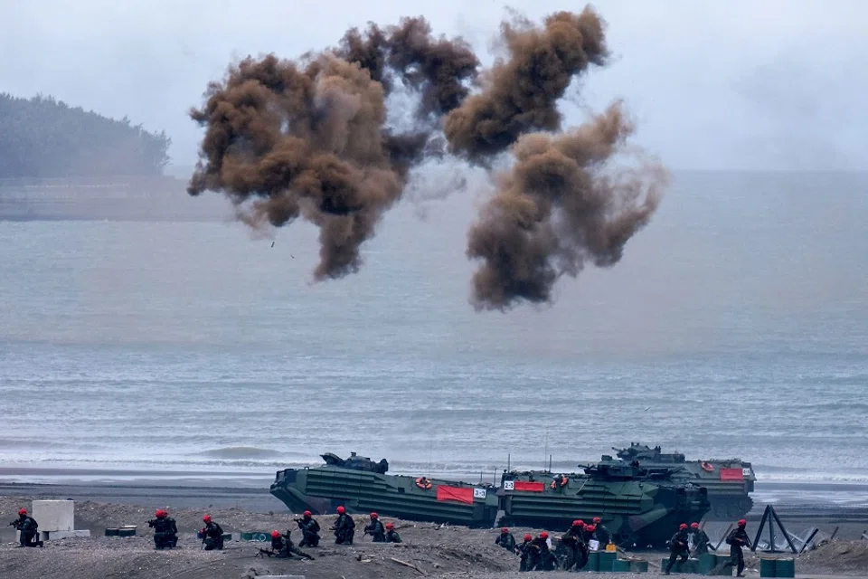 Armed vehicles and Taiwan military soldiers attend the annual Han Kuang anti-landing drill at Bali beach, New Taipei City, Taiwan, on 27 July 2023. (Sam Yeh/AFP)