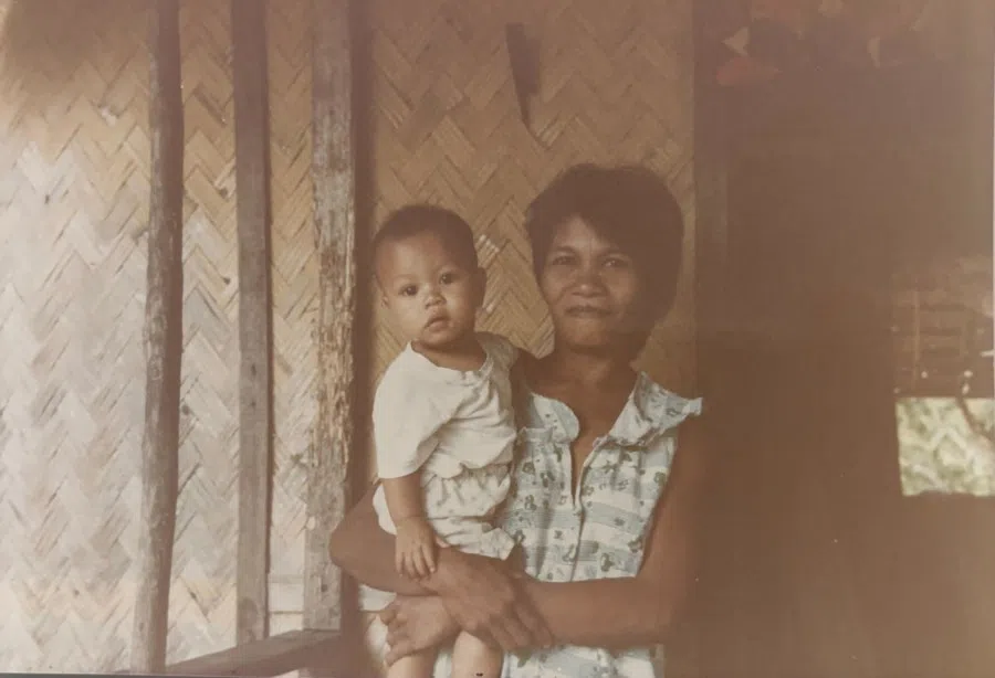 Gloria, the woman from the legendary “Taiwanese village”, and her child fathered by a Taiwanese man.