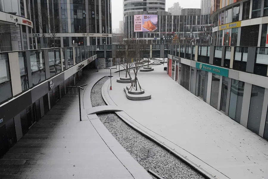 An empty shopping mall is seen in Beijing on 5 February 2020 as China's struggle to contain the deadly coronavirus is deepening concerns about the impact on its economy. (Greg Baker/AFP)