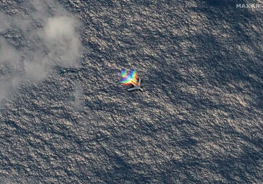 A Chinese H-6 bomber flies east of the disputed Scarborough Shoal in the South China Sea, on 24 March 2025. (Maxar Technologies/Handout via Reuters)