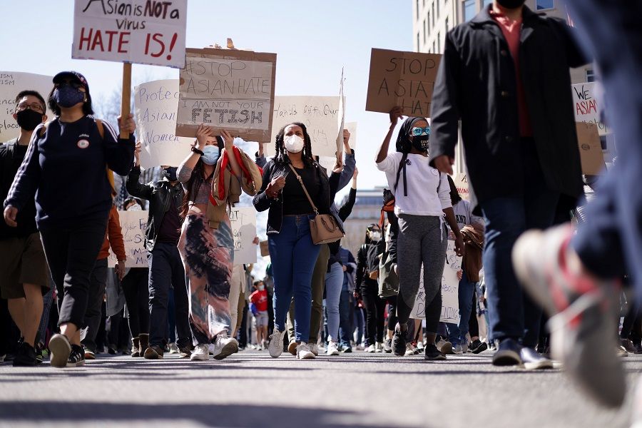Activists march toward Chinatown, at McPherson Square, on 21 March 2021 in Washington, DC, US. (Alex Wong/Getty Images/AFP)