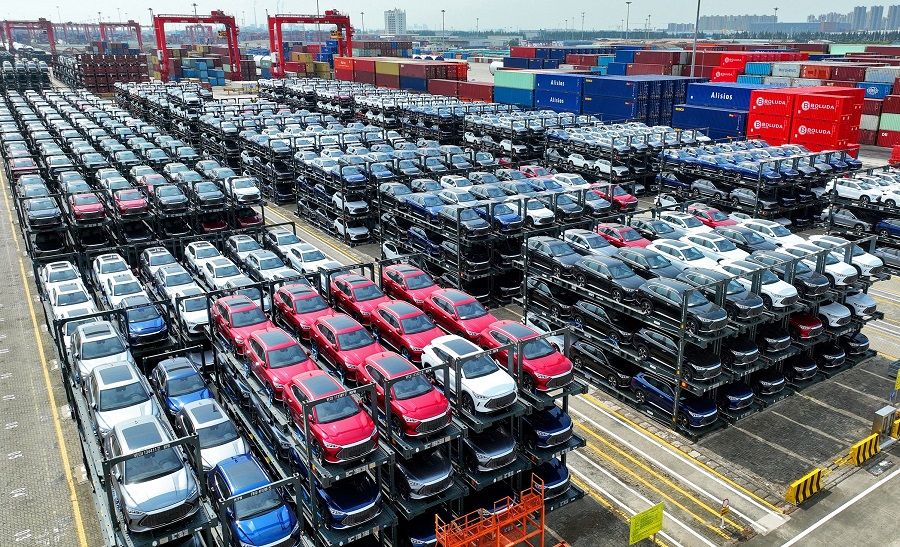 In this photo taken on 11 September 2023, BYD electric cars waiting to be loaded on a ship are stacked at the international container terminal of Taicang Port at Suzhou Port, in China's eastern Jiangsu province. China's top electric automaker BYD will build a car factory in Hungary, the company said on 22 December 2023, as it eyes expansion in the European market. (AFP)