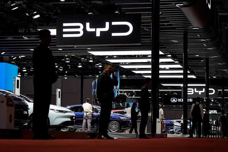 Security guards stand at the BYD booth at the Auto Shanghai show, in Shanghai, China, on 19 April 2023. (Aly Song/File Photo/Reuters)