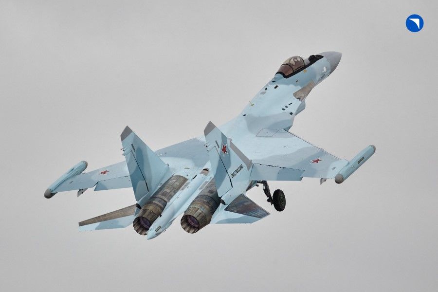 This handout picture provided by the Russian defence corporation Rostec on 24 November 2023 shows a Sukhoi Su-35S fighter jet at the grounds of an aviation firm in the far-eastern city of Komsomolsk-on-Amur. (Handout/Russian defence corporation Rostec/AFP)