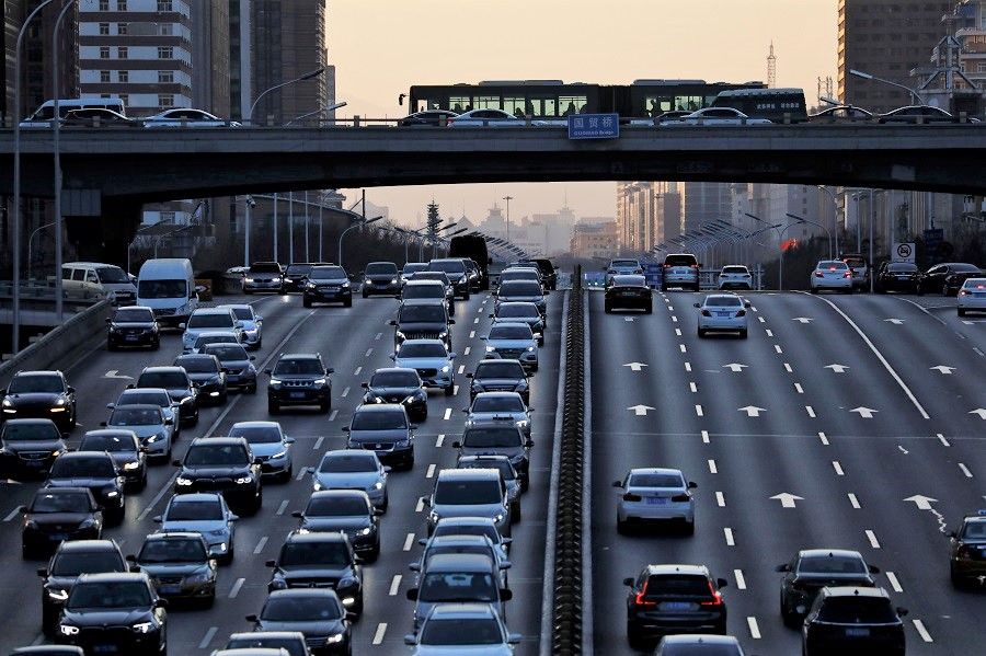 A view shows traffic during evening rush hour at the central business district in Beijing, China, 15 January 2021. (Tingshu Wang/Reuters)