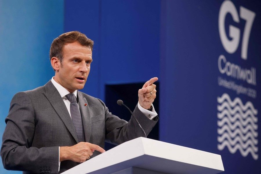 France's President Emmanuel Macron takes part in a press conference on the final day of the G7 summit in Carbis Bay, Cornwall on 13 June 2021. (Ludovic Marin/AFP)