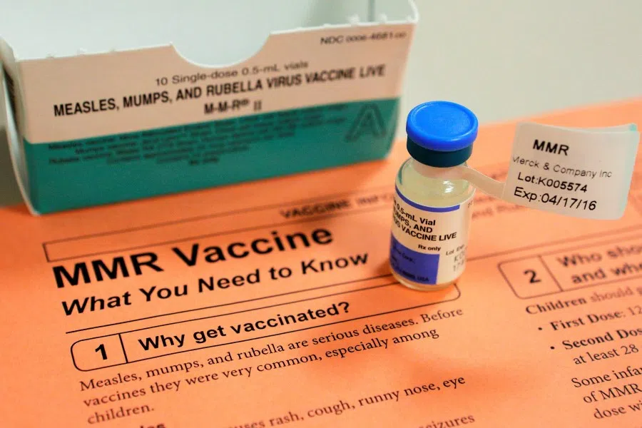 A vial of measles, mumps and rubella vaccine and an information sheet is seen at Boston Children's Hospital in Boston, Massachusetts 26 February 2015. (Brian Snyder/REUTERS)