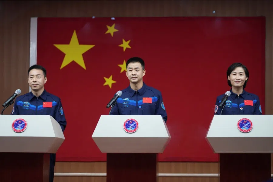 (left to right) Chinese astronauts Cai Xuzhe, Chen Dong and Liu Yang attend a news conference before the Shenzhou-14 spaceflight mission, China's third crewed mission to build its space station, at Jiuquan Satellite Launch Center near Jiuquan, Gansu province, China, 4 June 2022. (China Daily via Reuters)