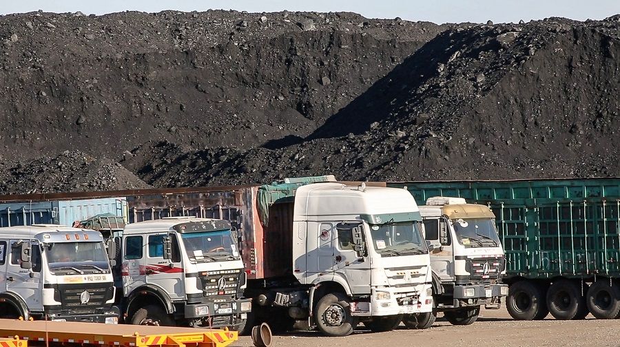 This video grab from footage taken on 16 October 2021 shows coal to be loaded on trucks near Gants Mod port at the Chinese border with Gashuun Sukhait, in Umnugovi province, in Mongolia. (Uugansukh Byamba/AFP)