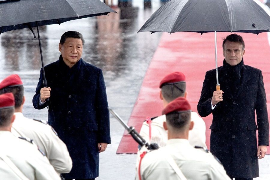 Chinese President Xi Jinping and French President Emmanuel Macron at Tarbes-Lourdes Pyrenees airport, in Tarbes, France, on 7 May 2024. (Matthieu Rondel/Bloomberg)