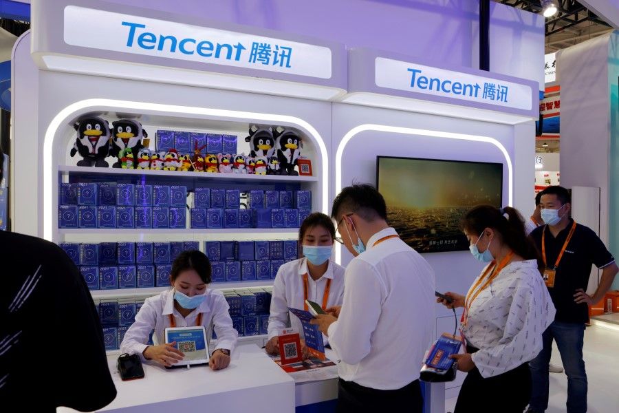 People visit a Tencent booth at the 2021 China International Fair for Trade in Services (CIFTIS) in Beijing, China, 3 September 2021. (Florence Lo/Reuters)
