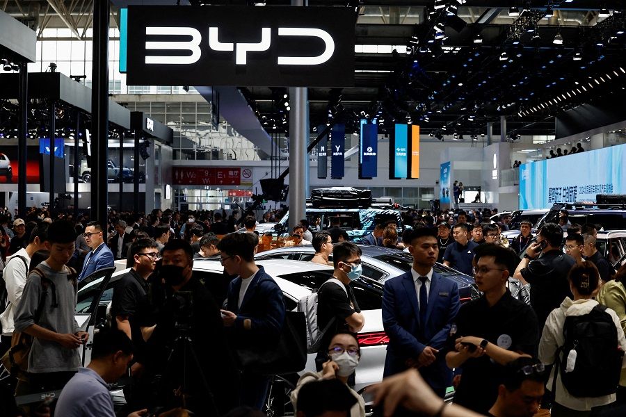 People visit the BYD booth at the Beijing International Automotive Exhibition, or Auto China 2024, in Beijing, China, on 25 April 2024.  (Tingshu Wang/Reuters)