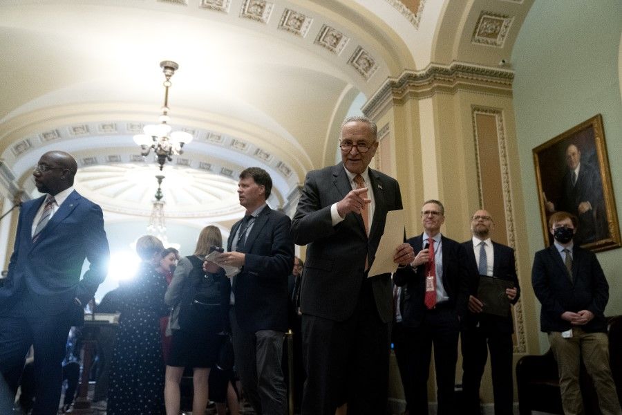 Senate Majority Leader Chuck Schumer, a Democrat from New York, centre, departs a news conference following Senate Democrat policy luncheons at the US Capitol in Washington, DC, US on 22 June 2021. (Stefani Reynolds/Bloomberg)