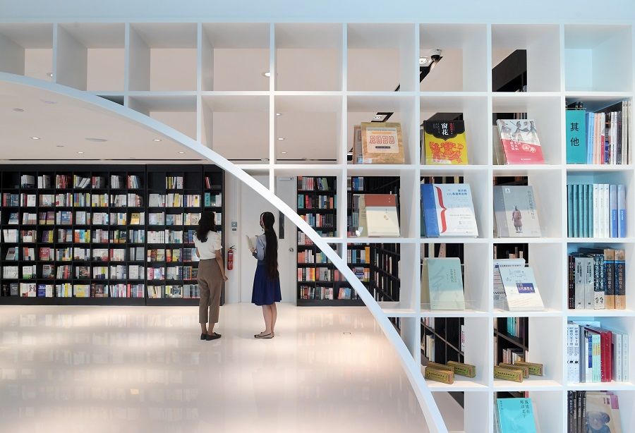 Zall Bookstore's black-and-white design is inspired by calligraphy and the architecture of Jiangnan Watertown, with a circular arch resembling a river bridge. (SPH)