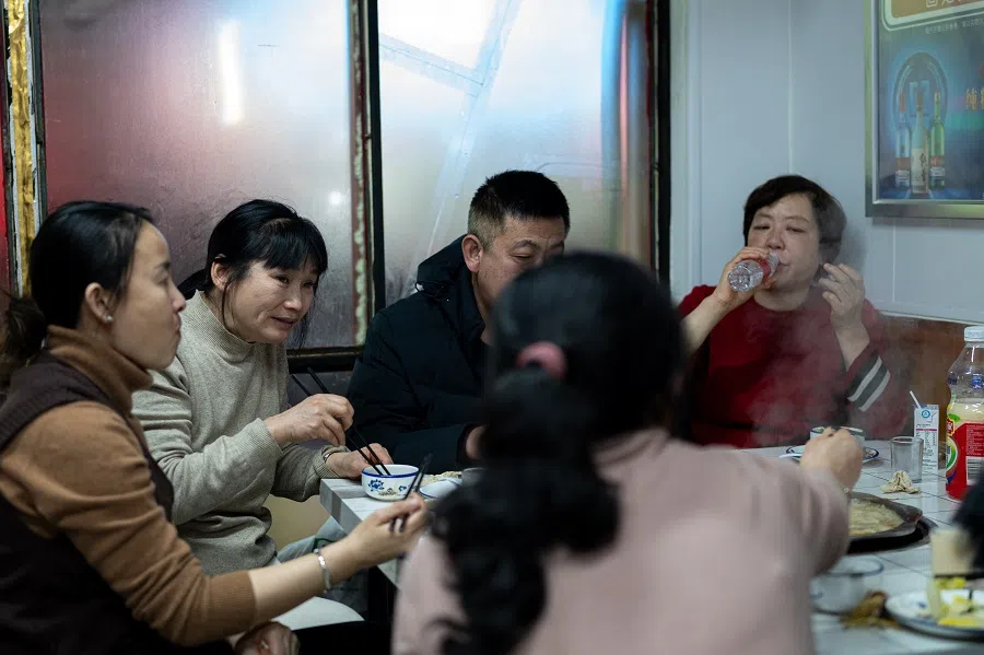 Sister Chen having a meal with some friends from Dongxindian Village.