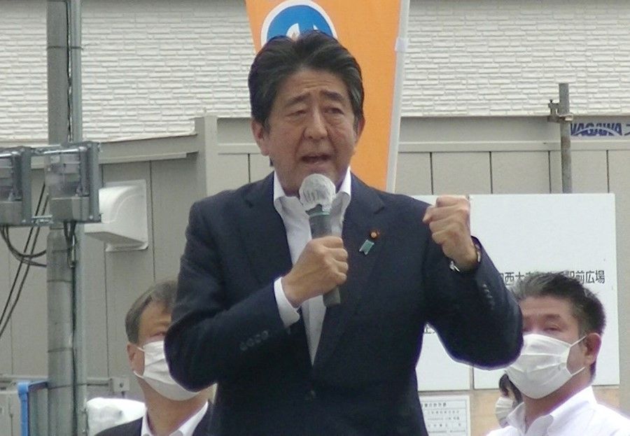 This image taken from video footage provided by witness Toshiharu Otani and released via Jiji Press shows former Japanese Prime Minister Shinzo Abe delivering an election campaign speech at Kintetsu Yamato-Saidaiji station square in Nara before he was shot. (Toshiharu Otani/Jiji Press/AFP)