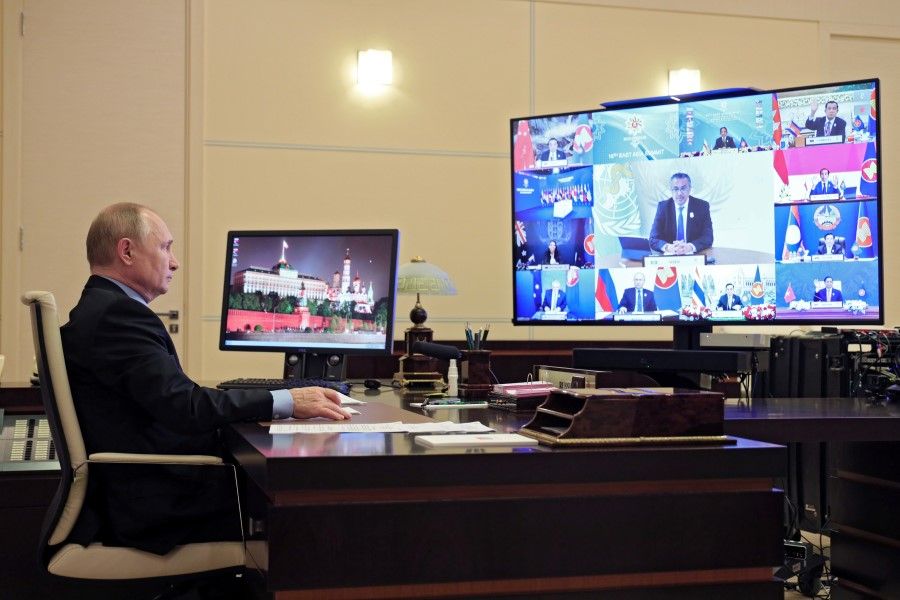 Russian President Vladimir Putin attends the virtual ASEAN East Asia Summit, hosted by ASEAN Summit chair Brunei, via a video conference at his residence outside Moscow, Russia, 27 October 2021. (Sputnik/Evgeniy Paulin/Kremlin via Reuters)