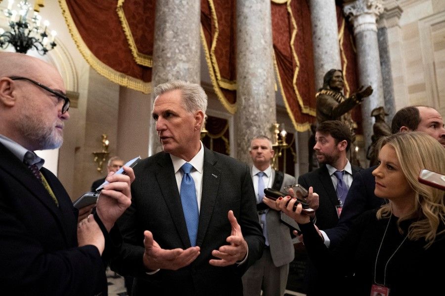 House Speaker Kevin McCarthy speaks to reporters as he walks from the House floor to his office at the US Capitol in Washington, DC, US, 9 January 2023. (Sarah Silbiger/Reuters)