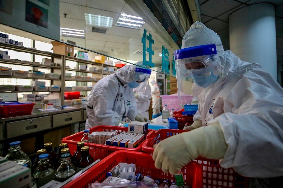 As of now, over 90% of America's antibiotics, vitamin C and ibuprofen are produced in China. In this photo taken on 10 March 2020, medical staff are seen arranging medicine at Red Cross Hospital in Wuhan. (STR/AFP)
