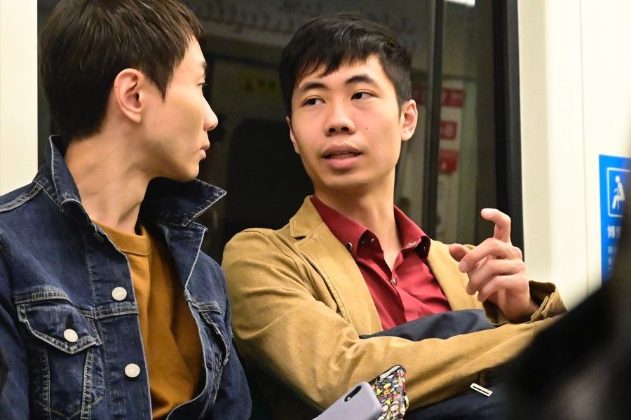 This picture taken on November 13, 2019 shows Hong Kong's Leonardo Wong (R) with his Taiwanese friend in Kaohsiung, southern Taiwan. The ongoing protests in Hong Kong are pushing residents to seek new lives abroad, with many turning to nearby democratic Taiwan. (Sam Yeh/AFP)