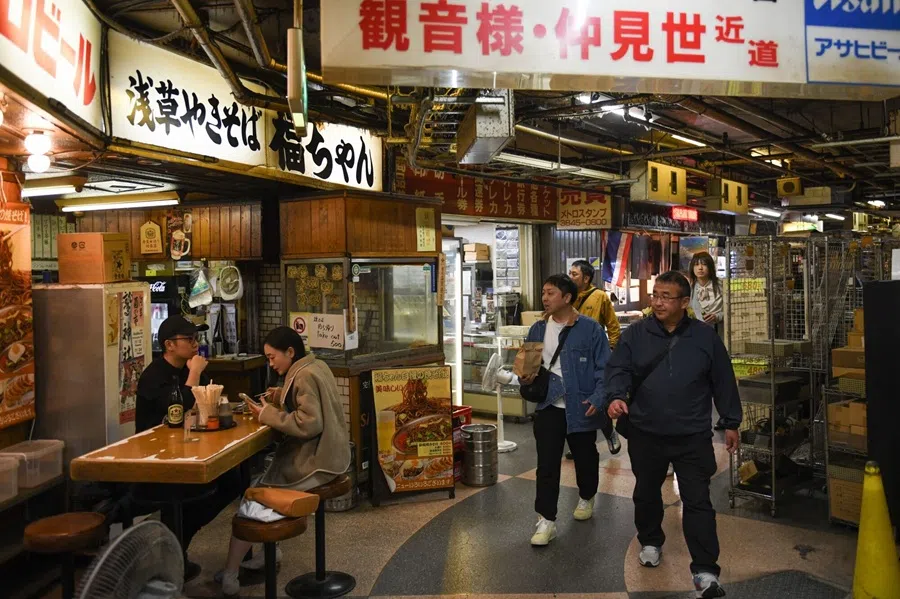 Visitors in the underground shopping center in the Asakusa district in Tokyo, Japan, on 16 November 2025. (Noriko Hayashi/Bloomberg)