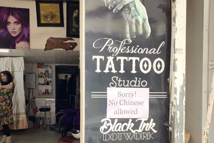 A sign outside a tattoo studio in Vietnam. (@DeimosValvicious/reddit)