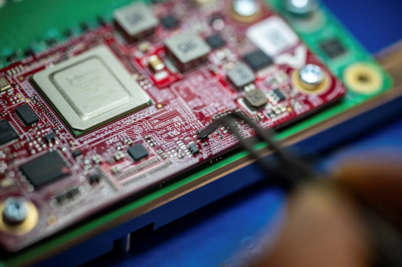 Recently launched Amazon artificial intelligence processors that aim to tackle Nvidia and the chips made by the other hyperscalers such as Microsoft and Google are shown at an Amazon lab in Austin, Texas, US, on 19 July 2024. (Sergio Flores/Reuters)