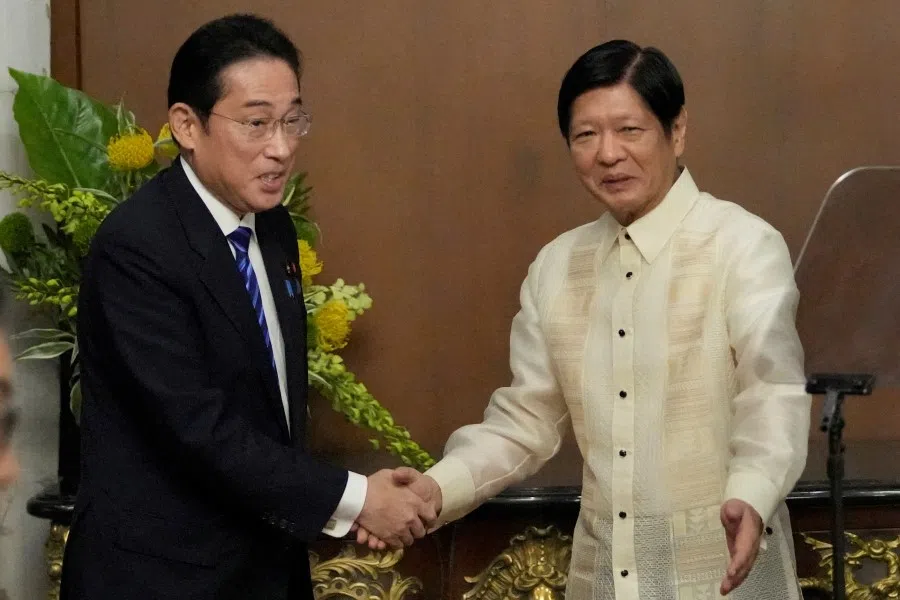 Japanese Prime Minister Fumio Kishida shakes hands with Philippine President Ferdinand "Bongbong" Marcos Jr after their joint statement at Malacanang Palace in Manila, Philippines, on 3 November 2023. (Aaron Favila/Reuters)