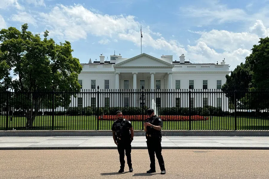 Members of the US Secret Service stand outside of the White House on 21 July 2024 in Washington, DC. (Daniel Slim/AFP)