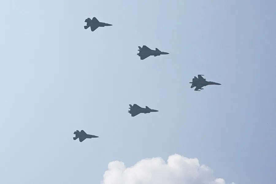 A formation of Shenyang J-16, Chengdu J-20 Mighty Dragon and Shenyang J-35 jet fighters perform a flyby during a military parade in Beijing’s Tiananmen Square on 3 September 2025. (Greg Baker/AFP)