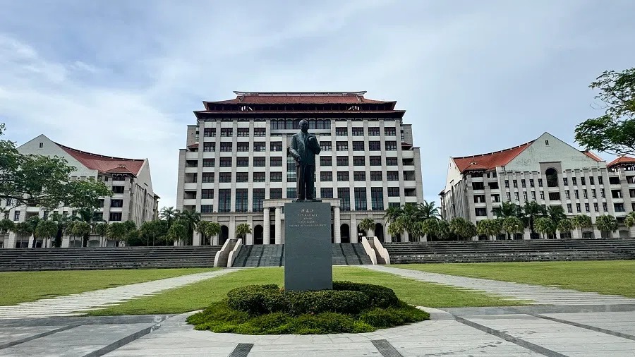 A cluster of Tan Kah Kee-style architecture blending white-walled Western buildings with Chinese red roofs at Xiamen University Malaysia, paying homage to the main Xiamen University campus.