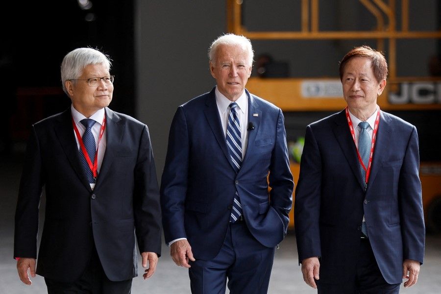US President Joe Biden walks with TSMC CEO CC Wei (left) and chair Mark Liu during a visit to TSMC AZ's first Fab (Semiconductor Fabrication Plant) in P1A (Phase 1A), in Phoenix, Arizona, US, 6 December 2022. (Jonathan Ernst/Reuters)