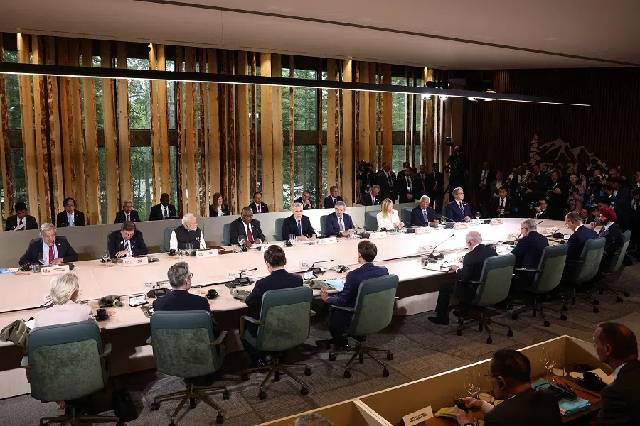 World leaders and outreach representatives gather for a working lunch with the theme, “Energy Security”, during the G7 summit at the Kananaskis Country Golf Course in Kananaskis, Alberta, Canada, on 17 June 2025. (Teresa Suarez/Pool/AFP)