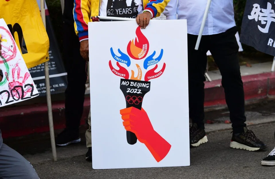 In this file photo taken on 3 November 2021, activists rally in front of the Chinese Consulate in Los Angeles, California, calling for a boycott of the 2022 Beijing Winter Olympics due to concerns over China's human rights record. (Frederic J. Brown/AFP)