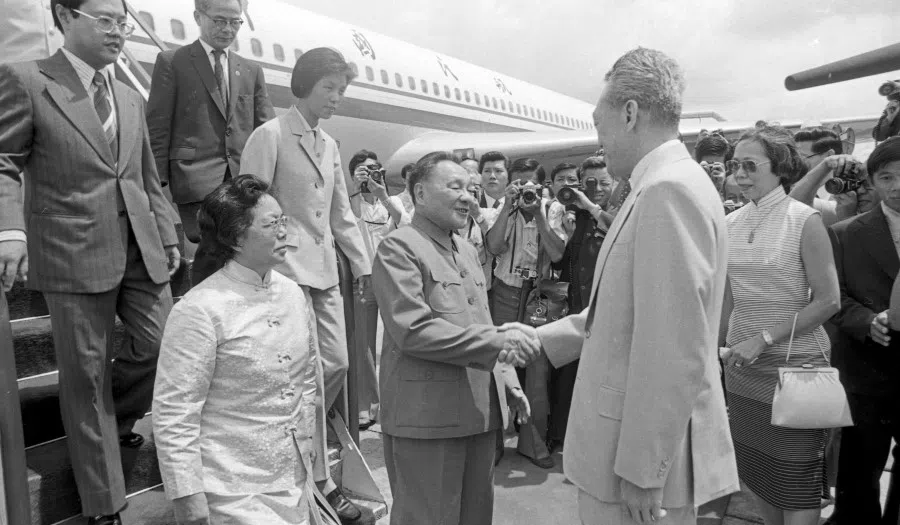 Deng Xiaoping (centre) arriving in Singapore for a state visit on 12 November 1978. (SPH)