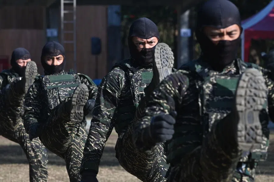 Taiwan's marine corps personnel demonstrate their skills during a military exercise in Kaohsiung, January 2020. (Sam Yeh/AFP)