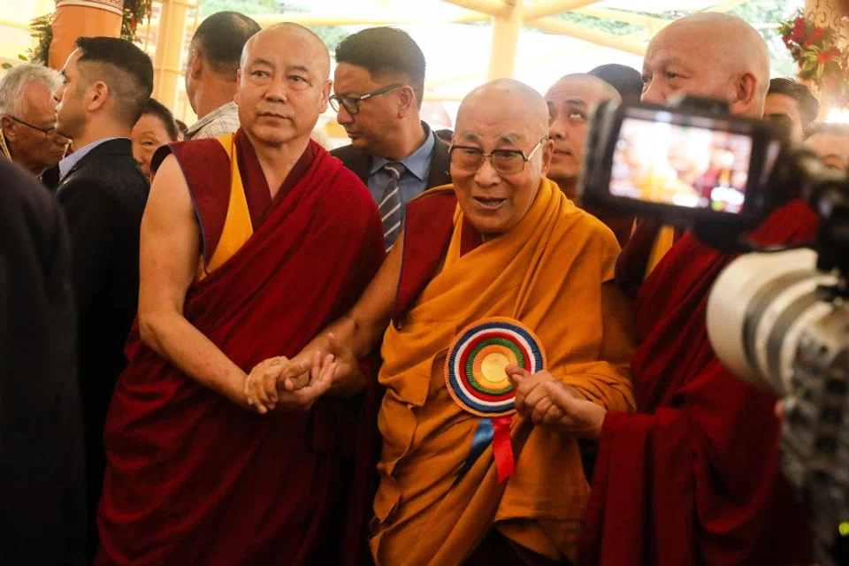 Tibetan spiritual leader the Dalai Lama (right) arrives to attend a Long Life Prayer offering ceremony at the Main Tibetan Temple in McLeod Ganj, near Dharamsala on 30 June 2025. (Sanjay Baid/AFP)