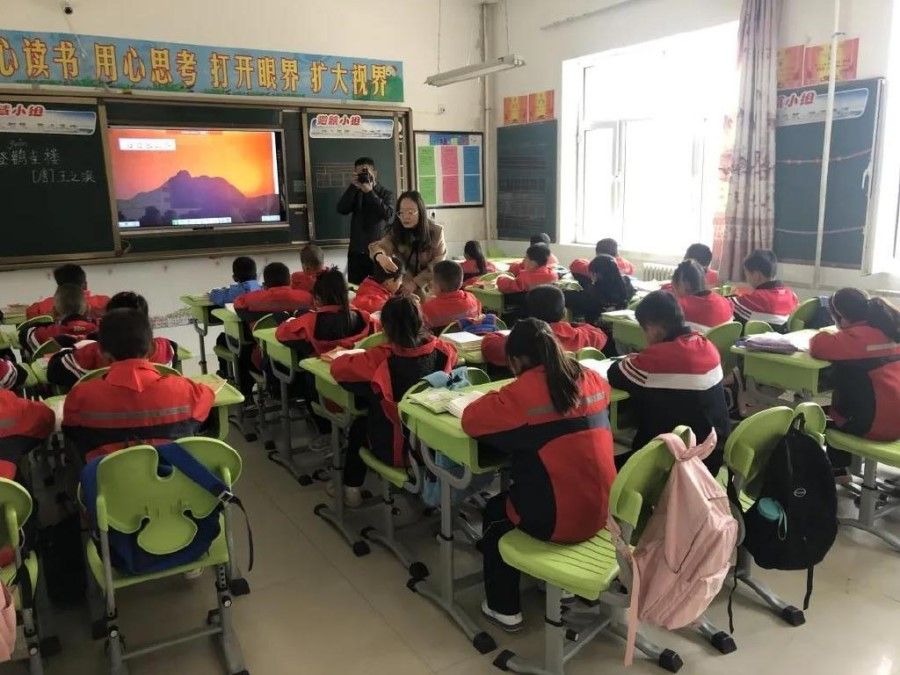 A classroom with desks and chairs donated by New Oriental, to replace old furniture, November 2021. (New Oriental/Weibo)