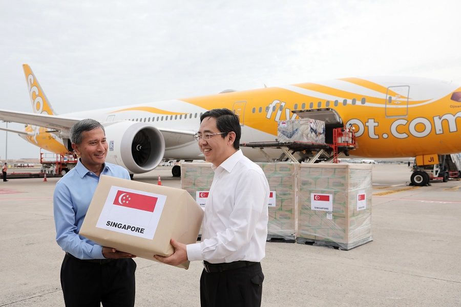 Singapore Minister for Foreign Affairs Dr Vivian Balakrishnan and Chinese Ambassador to Singapore Hong Xiaoyong attending a donation handover ceremony, 8 February 2020. (SPH)
