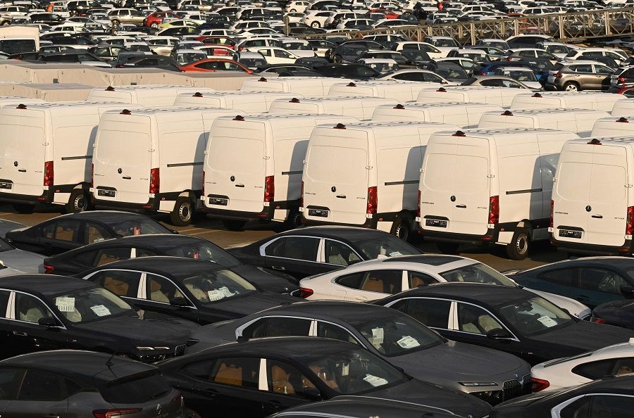 New cars of various brands and vans are parked for export on the parking of a car terminal at the harbour of Duisburg, Germany, on 19 July 2023. (Ina Fassbender/AFP)