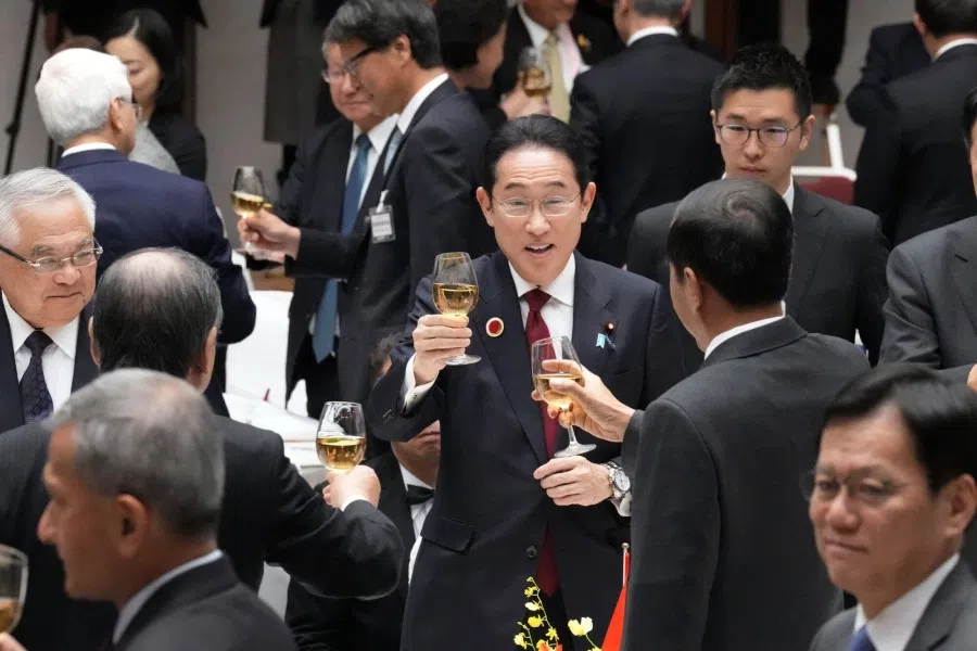 Japanese Prime Minister Fumio Koshida (centre) makes a toast during the ASEAN-Japan luncheon organised by Japanese business lobby Keidanren in Tokyo, Japan, on 18 December 2023. (Eugene Hoshiko/Bloomberg)
