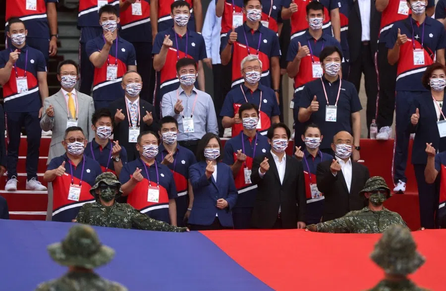 Taiwan's President Tsai Ing-wen poses for a group photo with Taiwanese athletes who participated in Tokyo 2020 Olympic Games, in front of the Presidential Office Building in Taipei on 1 September 2021. (Ann Wang/Reuters)