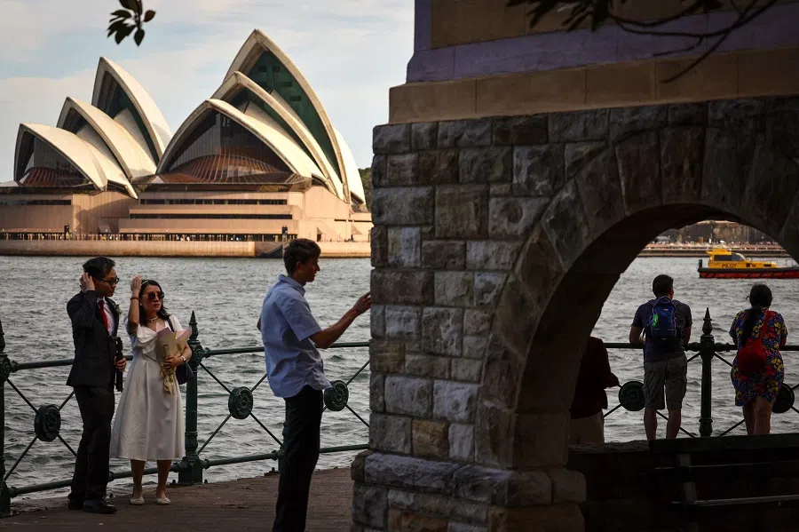 People on the harbour opposite the Sydney Opera House in Sydney, Australia on 1 October 2023. (David Gray/AFP)