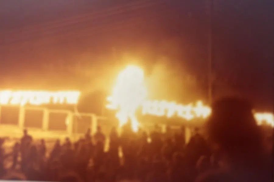 An ancient induction ceremony for Israeli new recruits in Jerusalem’s Old City, with torches held high and flames blazing, imbued with religious solemnity.