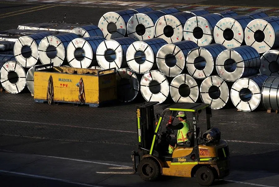 Steel rolls from China are seen after being unloaded at the Valparaiso port, in Chile, on 10 July 2025. (Rodrigo Garrido/Reuters)