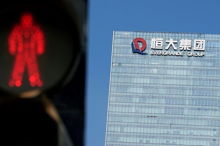 A traffic light is seen near the headquarters of China Evergrande Group in Shenzhen, Guangdong province, China, 26 September 2021. (Aly Song/File Photo/Reuters)