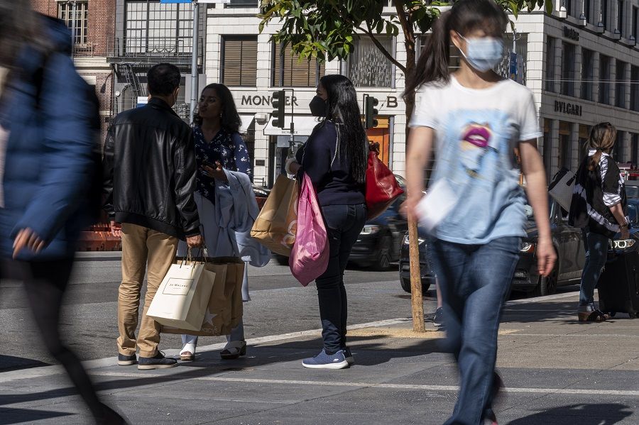 Pedestrians carry shopping bags on Geary street in San Francisco, California, US, on 18 May 2022. (David Paul Morris/Bloomberg)