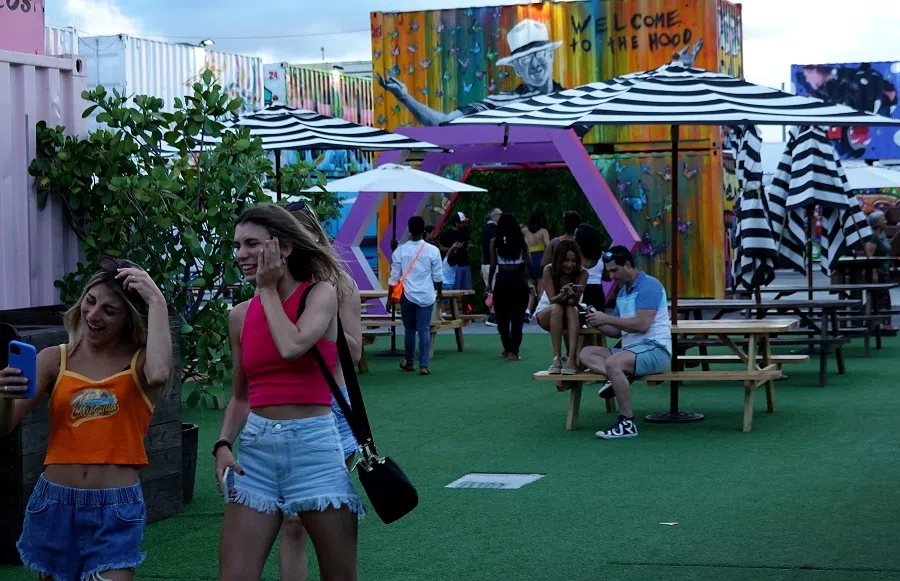 People enjoy the Wynwood neighbourhood on 15 July 2022 in Miami, Florida, US. (Joe Raedle/Getty Images/AFP)