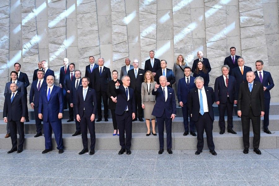 World leaders gather for a group photo at NATO headquarters in Brussels, 24 March 2022. (John Thys/AFP)