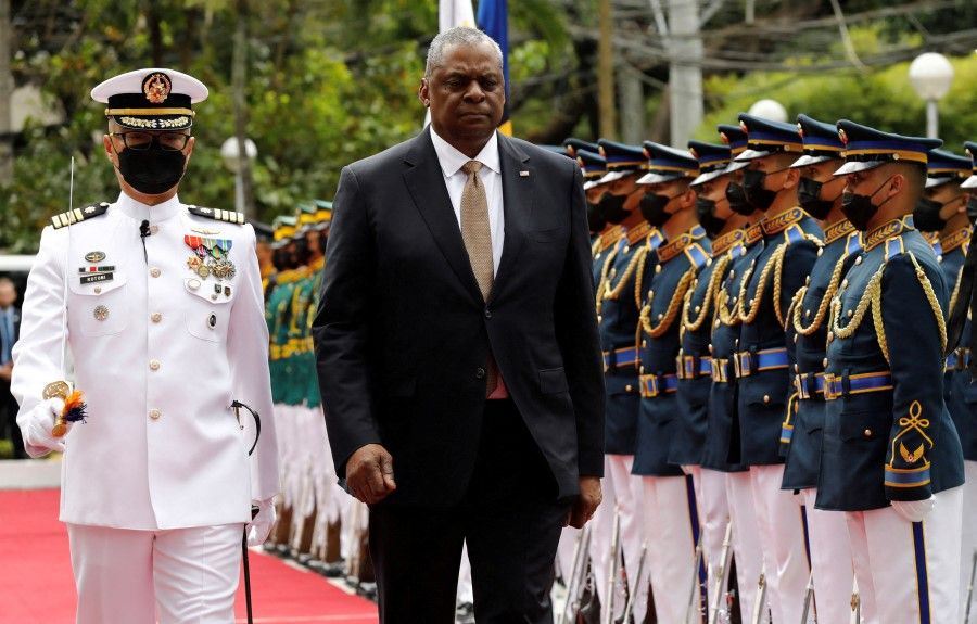 US Defence Secretary Lloyd Austin III walks past military guards during arrival honors at the Department of National Defense in Camp Aguinaldo military camp in Quezon City, Metro Manila, Philippines, 2 February 2023. (Rolex dela Pena/Pool via Reuters)